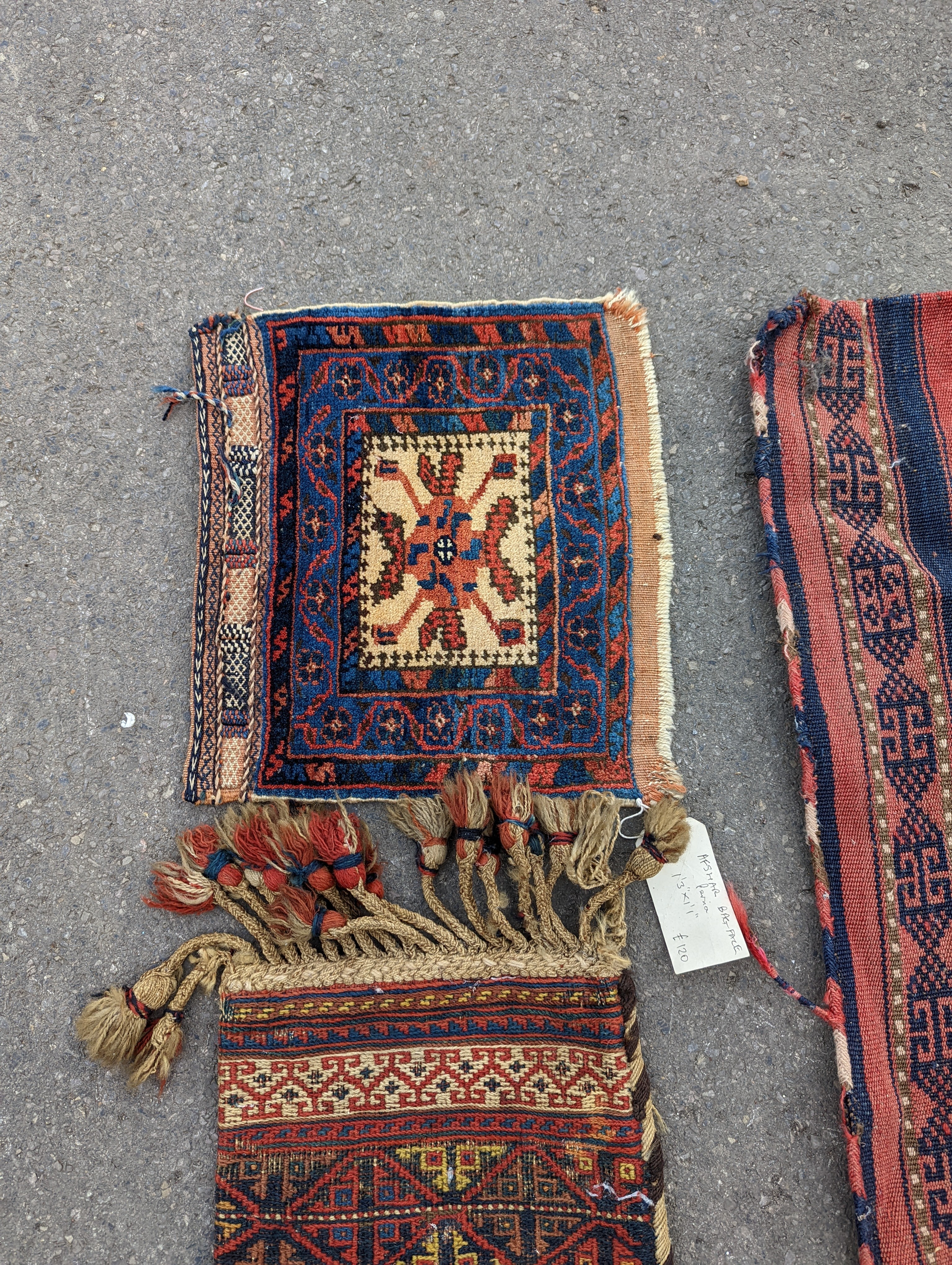 An Afghan Kilim flatweave saddlebag, 144 x 69cm together with six assorted bags, faces, etc.